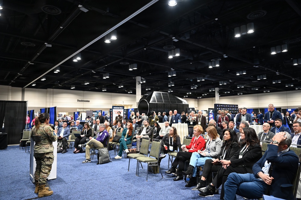 Col. Shannon DaSilva, Space Delta 10's commander, presents at the Space Mobility Conference