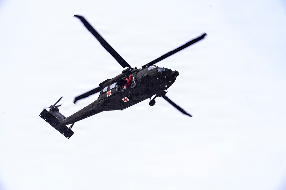 Wyoming Army Aviation teams and Big Horn County Serach and Rescue team perform hoist training