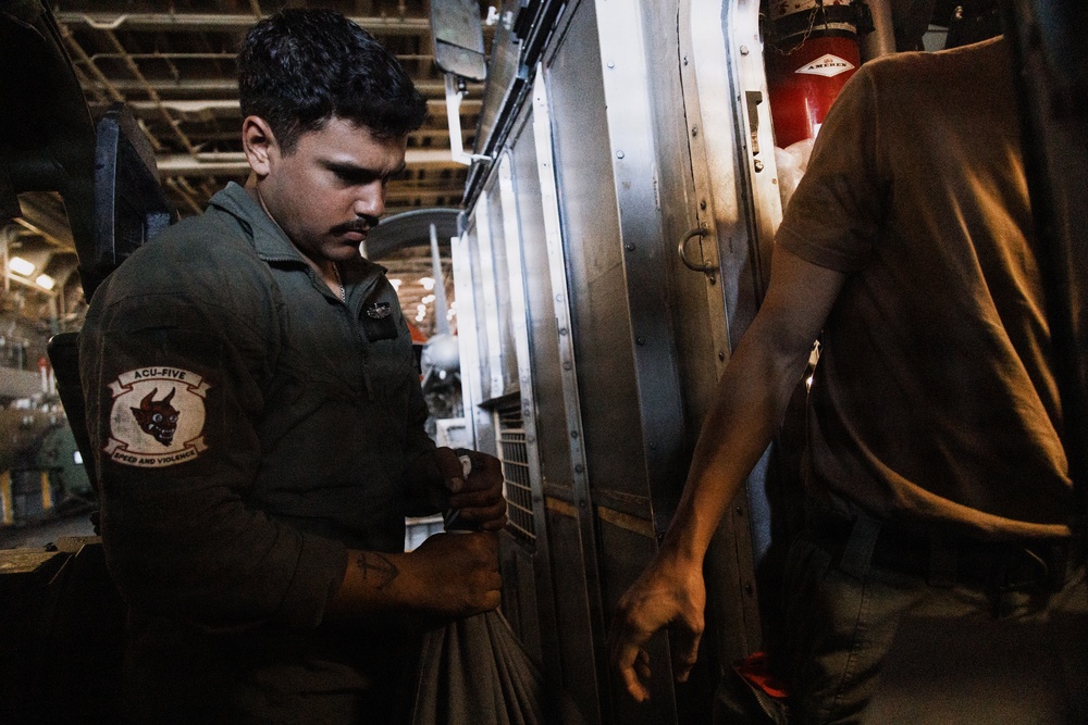 CLB 11 Marines, Assault Craft Unit 5 Sailors disembark from USS Portland