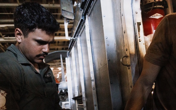 CLB 11 Marines, Assault Craft Unit 5 Sailors disembark from USS Portland