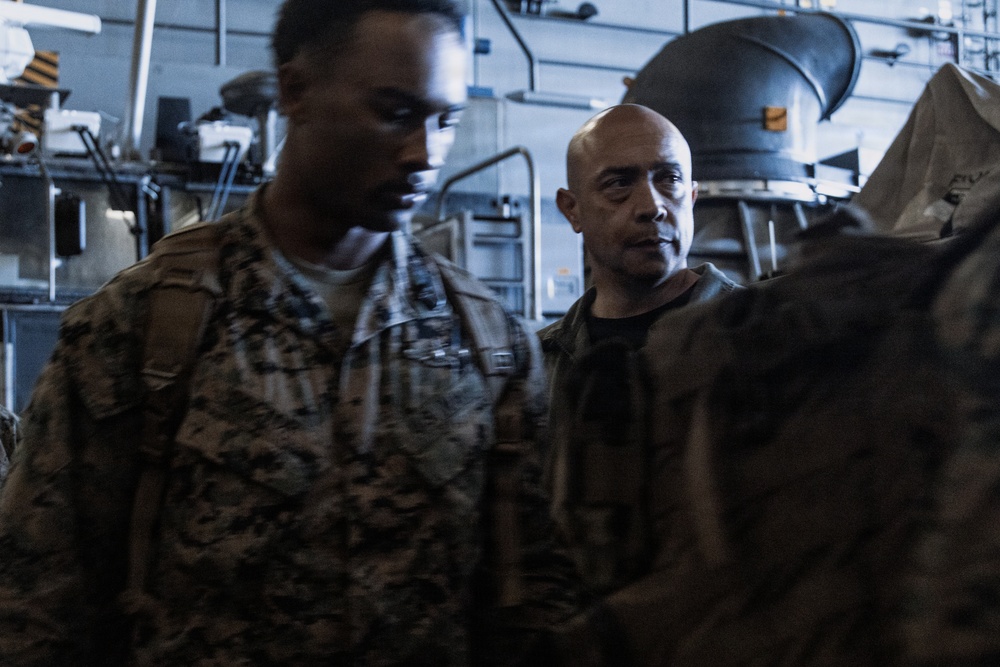 CLB 11 Marines, Assault Craft Unit 5 Sailors disembark from USS Portland