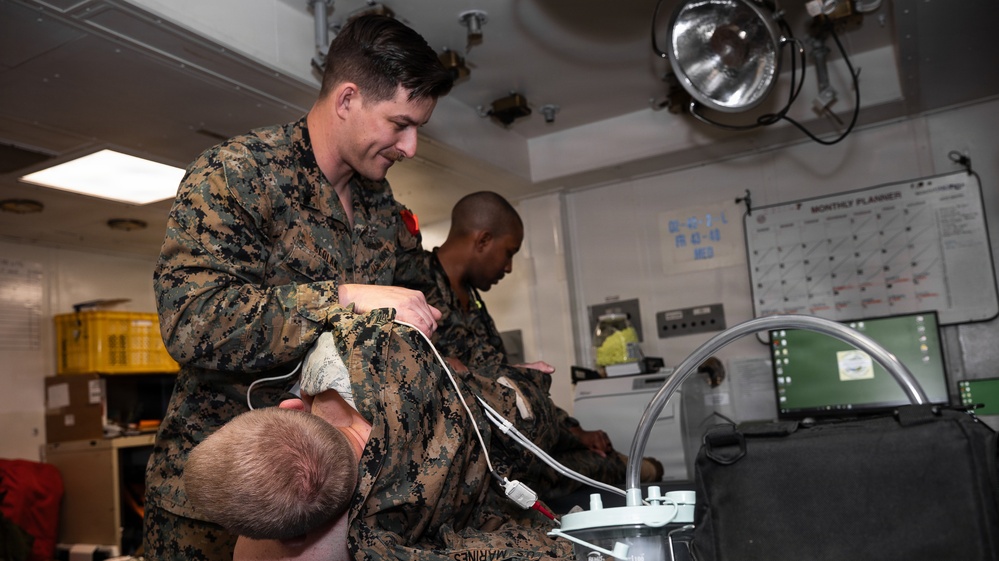 Navy Corpsmen Respond to Mass Casualty Drill aboard USS Ashland