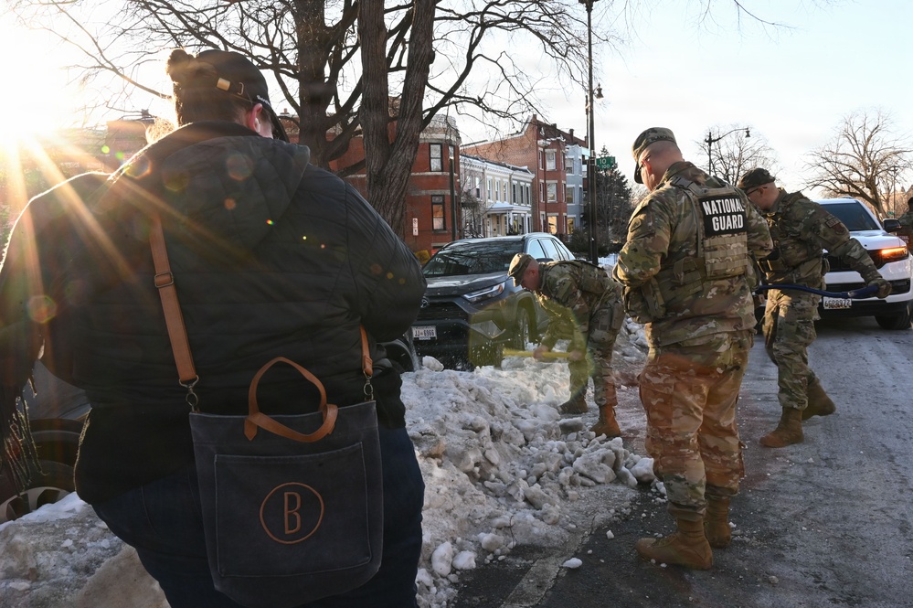 D.C. Guard Team Helps Citizen Move Car out of Ice