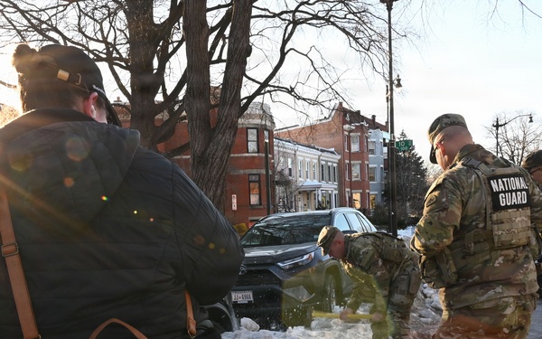 D.C. Guard Team Helps Citizen Move Car out of Ice