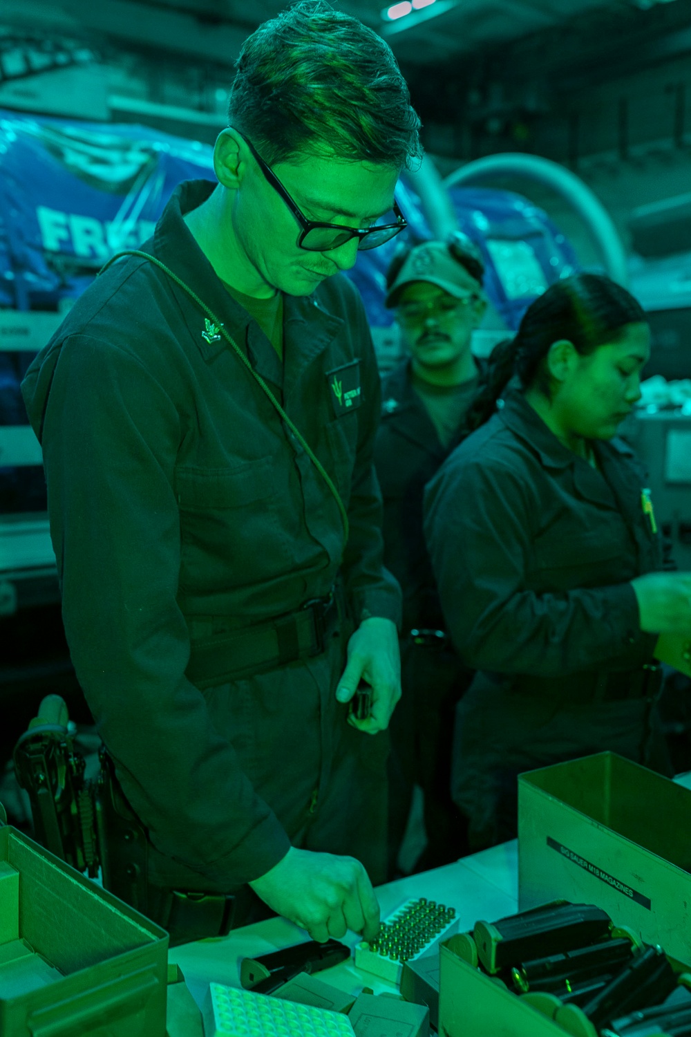 USS Tripoli Conducts A Low Light Gun Shoot
