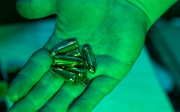 USS Tripoli Conducts A Low Light Gun Shoot