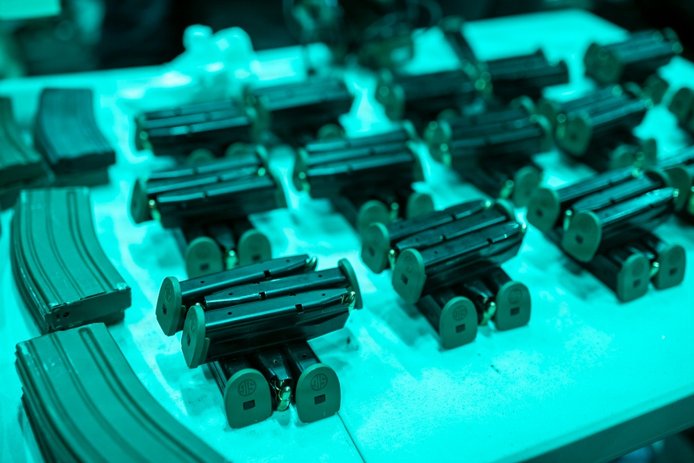 USS Tripoli Conducts A Low Light Gun Shoot