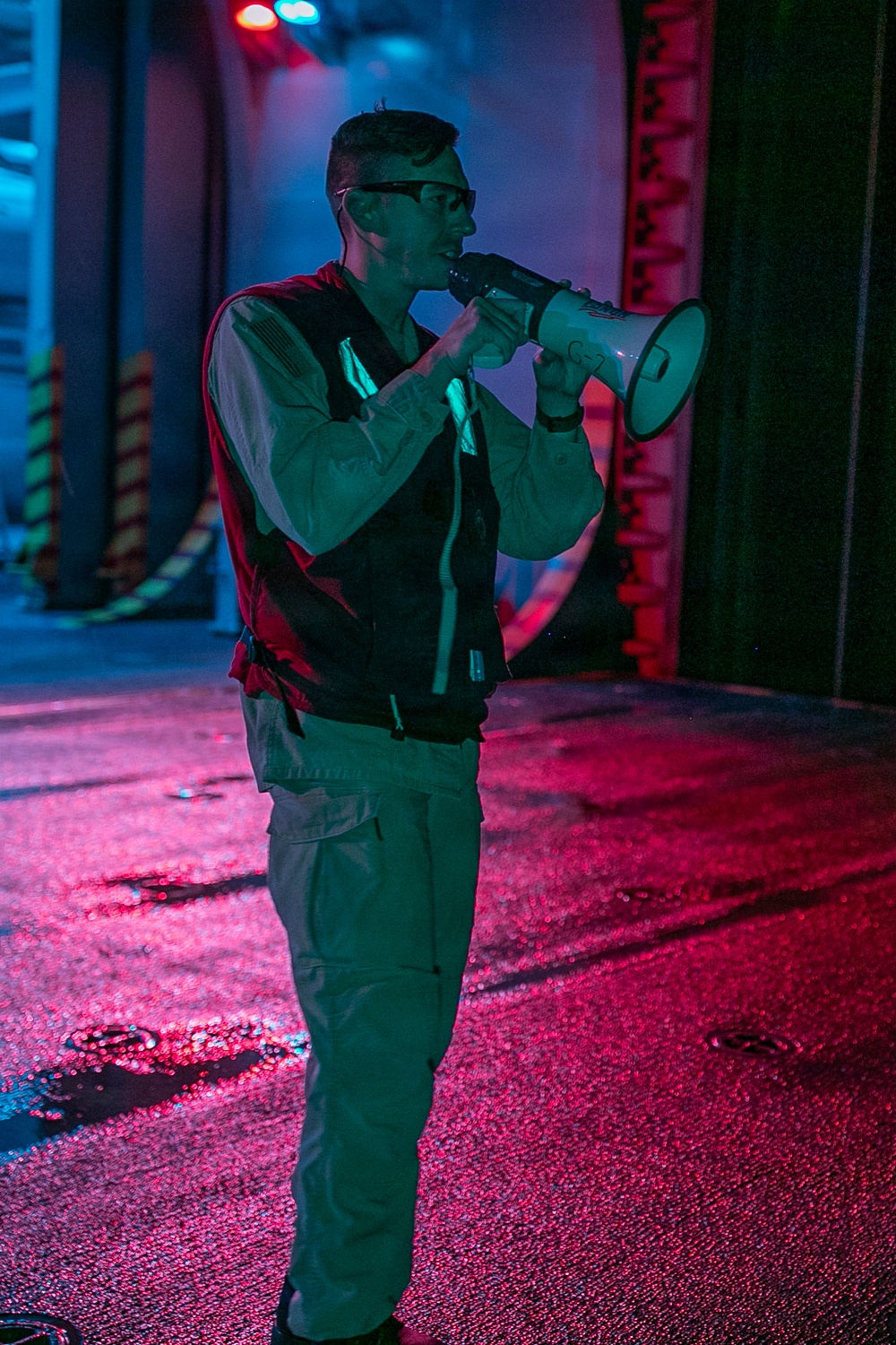 USS Tripoli Conducts A Low Light Gun Shoot