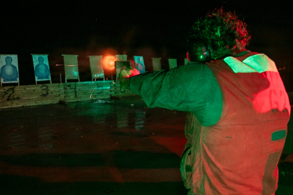 USS Tripoli Conducts A Low Light Gun Shoot
