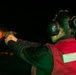 USS Tripoli Conducts A Low Light Gun Shoot