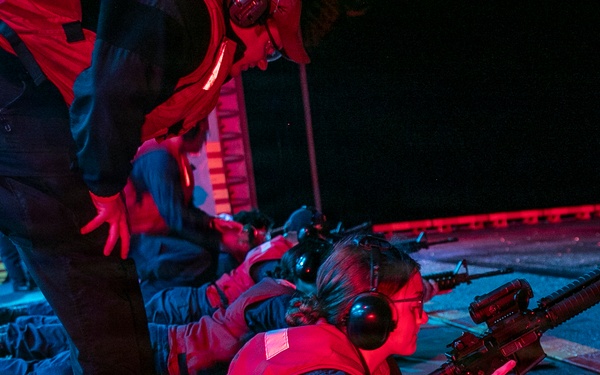 USS Tripoli Conducts A Low Light Gun Shoot