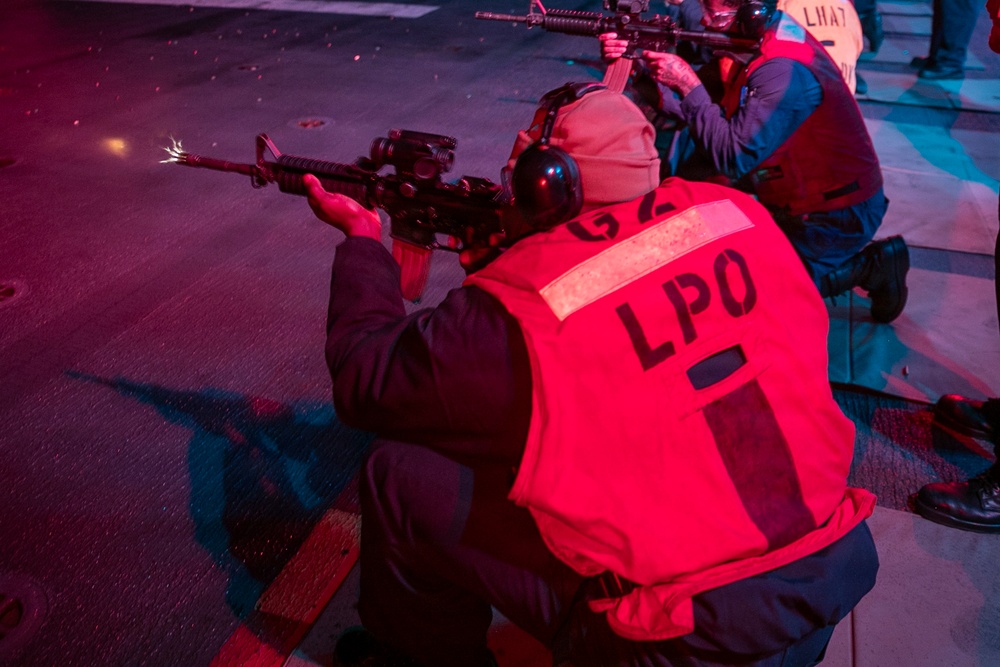 USS Tripoli Conducts A Low Light Gun Shoot