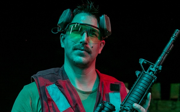 USS Tripoli Conducts A Low Light Gun Shoot