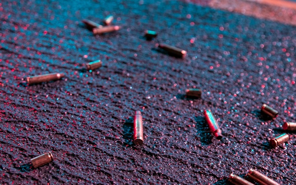 USS Tripoli Conducts A Low Light Gun Shoot