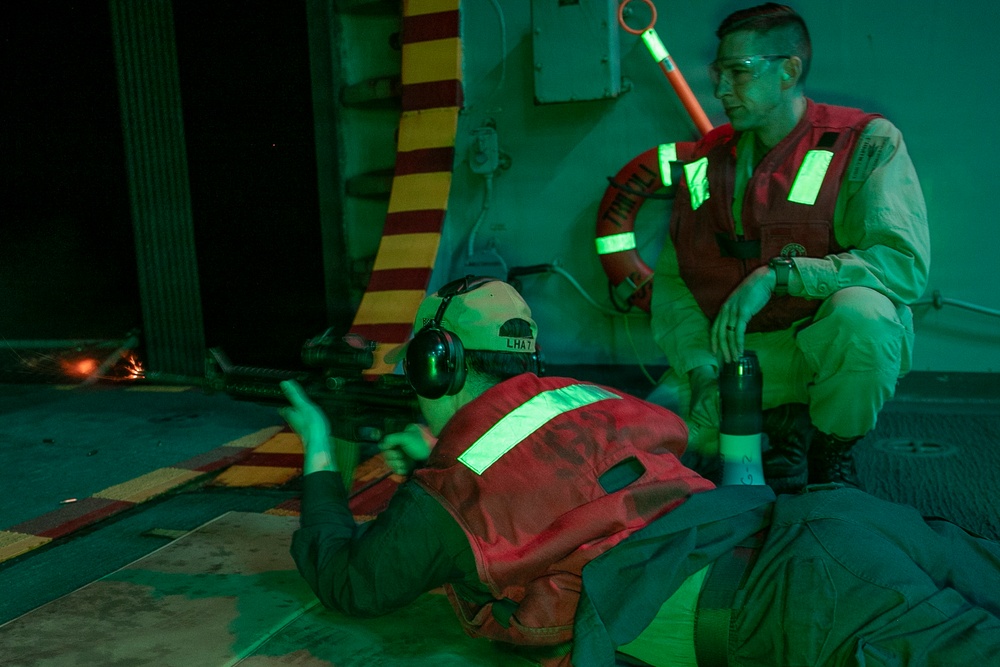 USS Tripoli Conducts A Low Light Gun Shoot