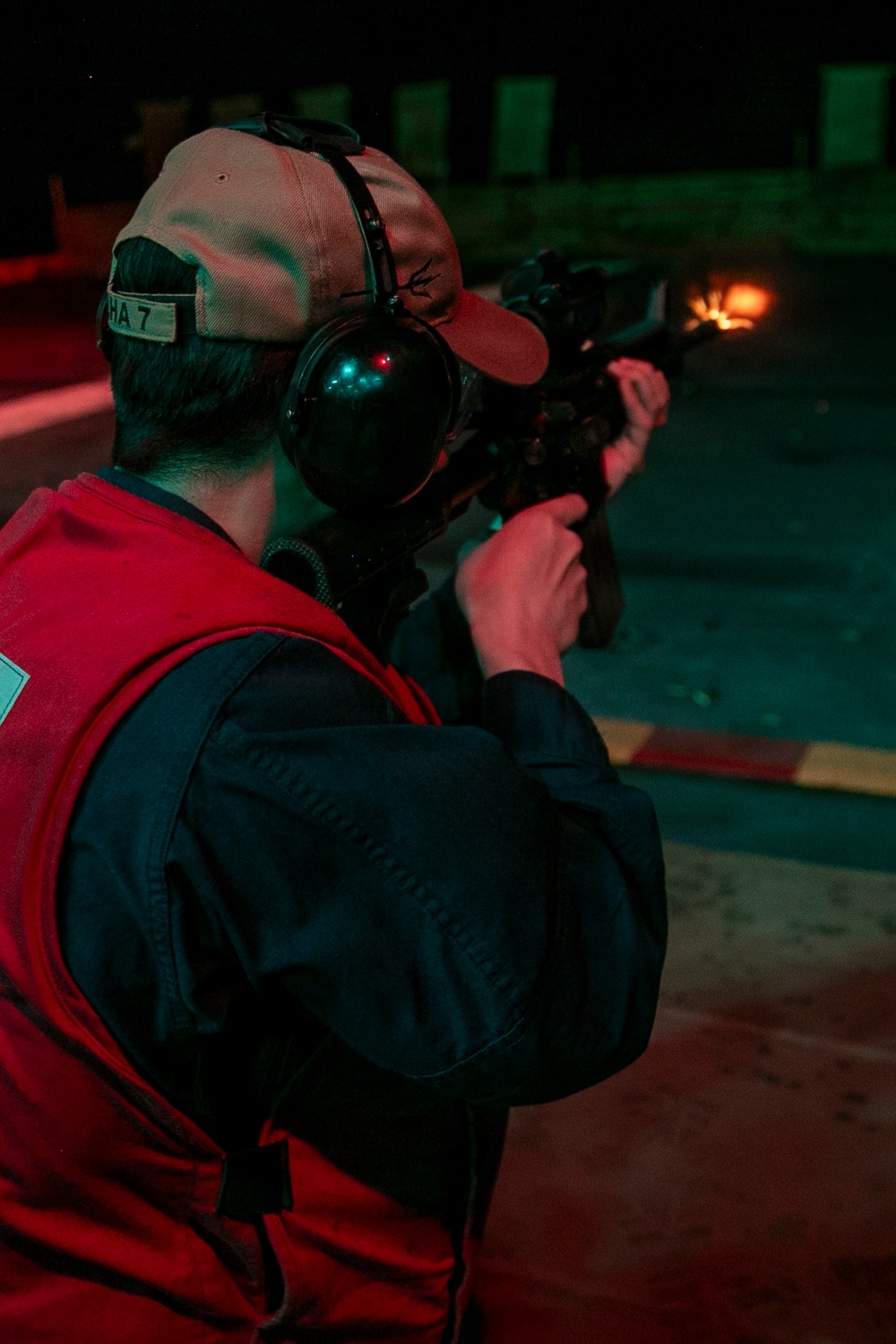 USS Tripoli Conducts A Low Light Gun Shoot