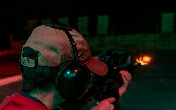 USS Tripoli Conducts A Low Light Gun Shoot