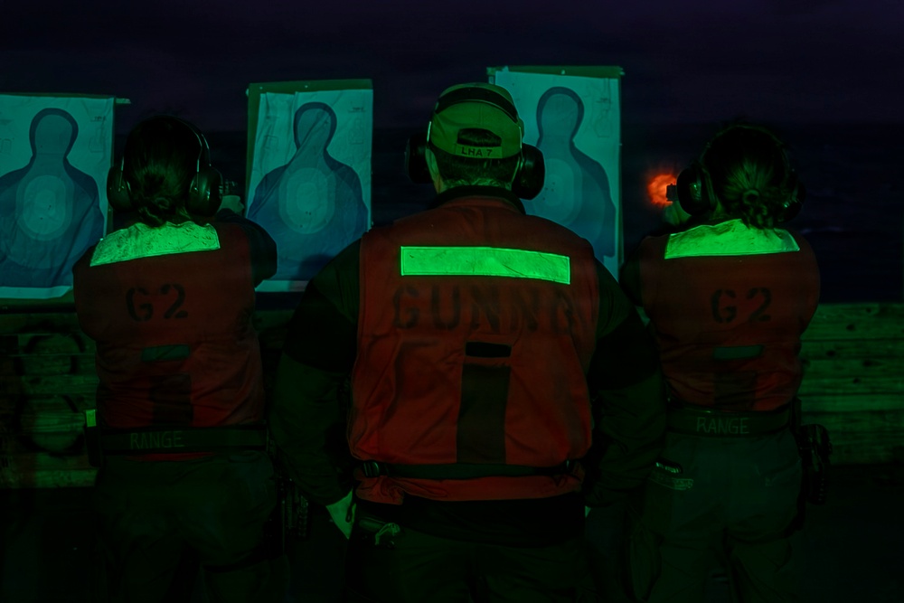 USS Tripoli Conducts A Low Light Gun Shoot