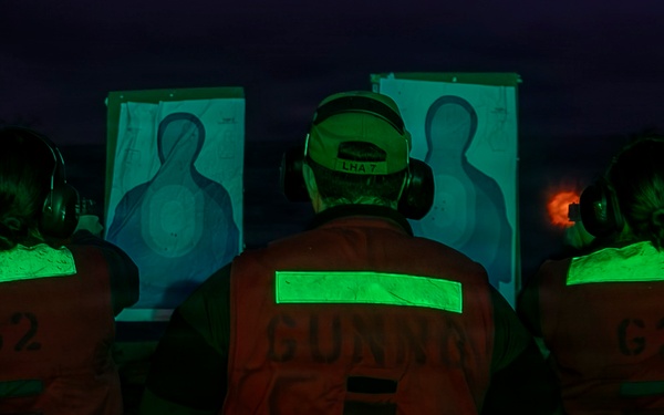 USS Tripoli Conducts A Low Light Gun Shoot