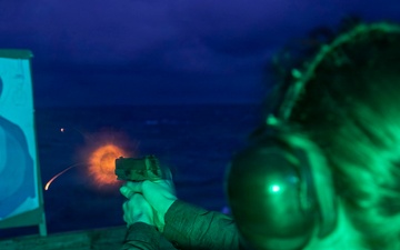 USS Tripoli Conducts A Low Light Gun Shoot