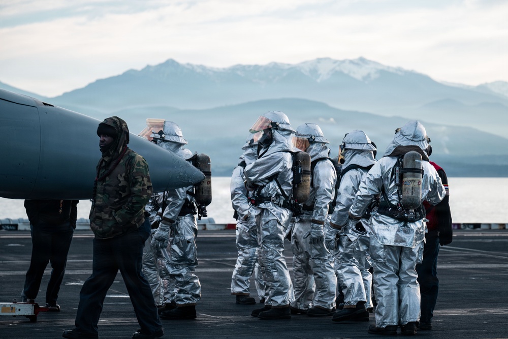 USS Theodore Roosevelt Departs From Indian Island