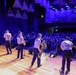 U.S. Naval Forces Europe and Africa Band (Topside Brass Band) play a concert for students and staff of the Mahatma Gandhi Institute Secondary School (MGISS)