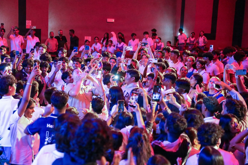 U.S. Naval Forces Europe and Africa Band (Topside Brass Band) play a concert for students and staff of the Mahatma Gandhi Institute Secondary School (MGISS)