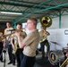 U.S. Naval Forces Europe and Africa Band (Topside Brass Band) perform for students and teachers at Vent d'un Rêve