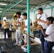 U.S. Naval Forces Europe and Africa Band (Topside Brass Band) perform for students and teachers at Vent d'un Rêve