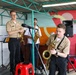 U.S. Naval Forces Europe and Africa Band (Topside Brass Band) perform for students and teachers at Vent d'un Rêve