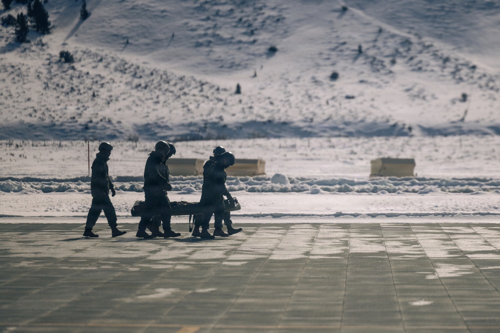 U.S. service members practice joint-service casualty evacuation drills during Mountain Medicine Course 1-26