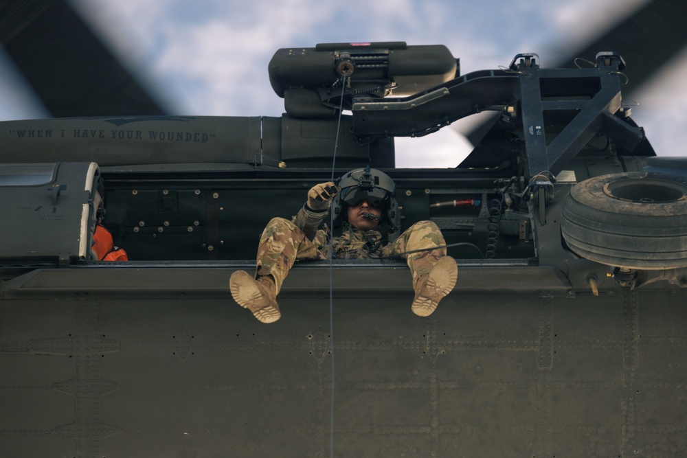 U.S. service members practice joint-service casualty evacuation drills during Mountain Medicine Course 1-26