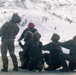 U.S. service members practice joint-service casualty evacuation drills during Mountain Medicine Course 1-26