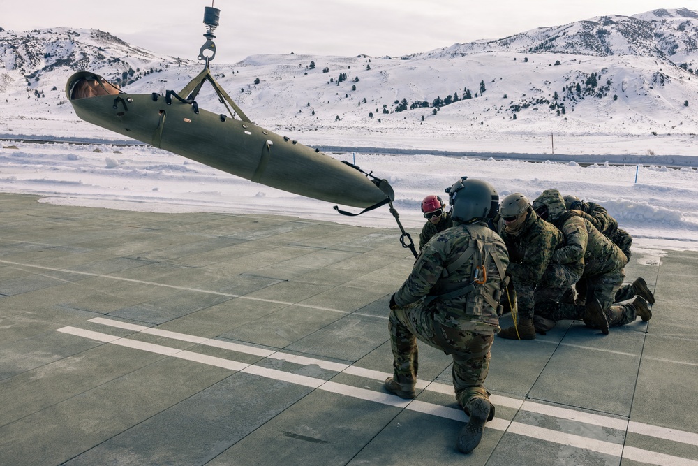 U.S. service members practice joint-service casualty evacuation drills during Mountain Medicine Course 1-26