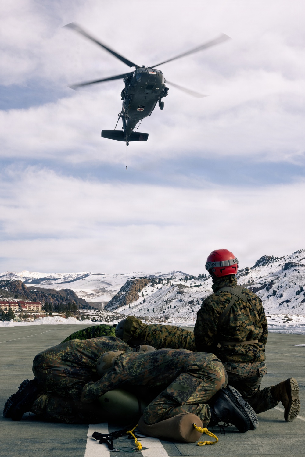 U.S. service members practice joint-service casualty evacuation drills during Mountain Medicine Course 1-26