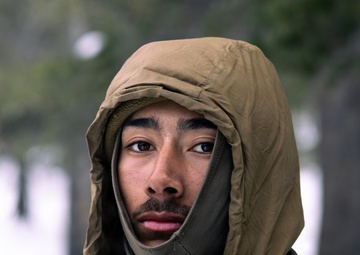 U.S. Marines with 2nd Bn., 4th Marines receive hot food during MTX 1-26