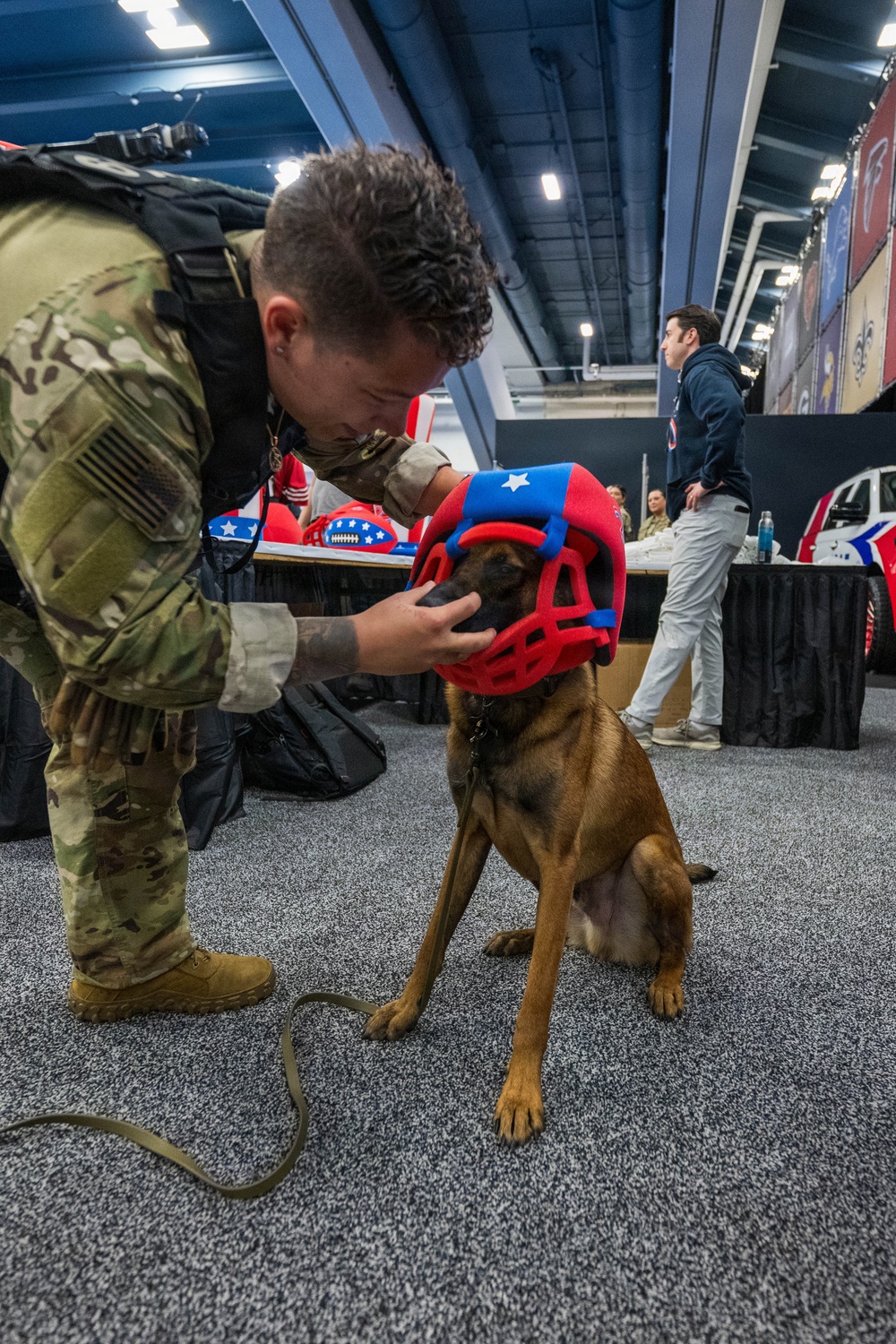 U.S. Coast Guard Maritime Safety and Security Team conduct K-9 sweeps in preparation for the Super Bowl.