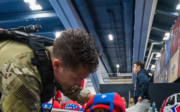 U.S. Coast Guard Maritime Safety and Security Team conduct K-9 sweeps in preparation for the Super Bowl.