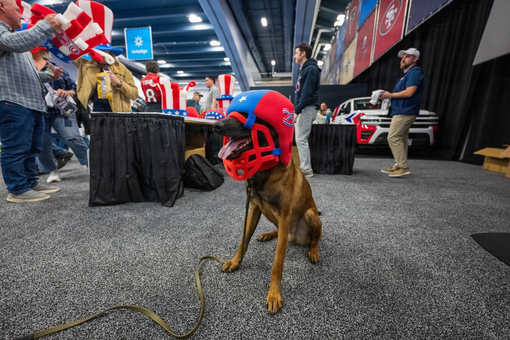 U.S. Coast Guard Maritime Safety and Security Team conduct K-9 sweeps in preparation for the Super Bowl.