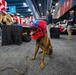 U.S. Coast Guard Maritime Safety and Security Team conduct K-9 sweeps in preparation for the Super Bowl.