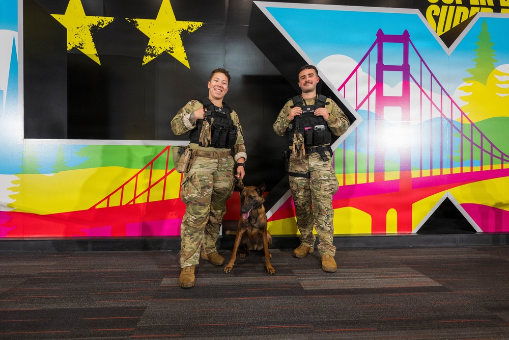 U.S. Coast Guard Maritime Safety and Security Team conduct K-9 sweeps in preparation for the Super Bowl.