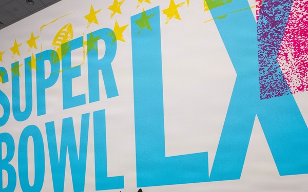 U.S. Coast Guard Maritime Safety and Security Team conduct K-9 sweeps in preparation for the Super Bowl.