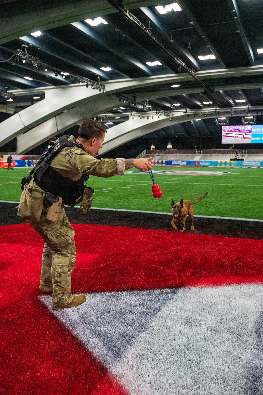 U.S. Coast Guard Maritime Safety and Security Team conduct K-9 sweeps in preparation for the Super Bowl.