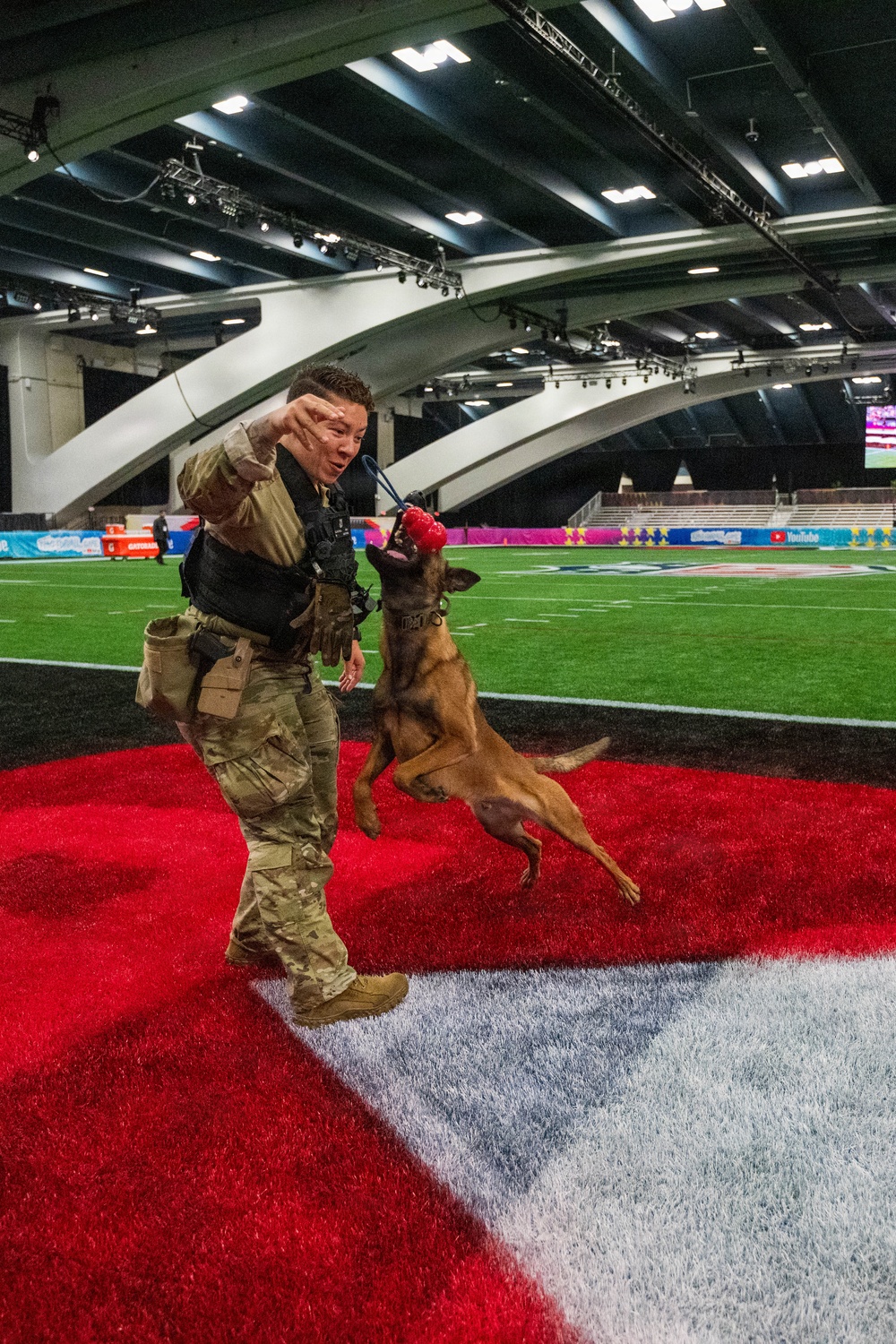 U.S. Coast Guard Maritime Safety and Security Team conduct K-9 sweeps in preparation for the Super Bowl.