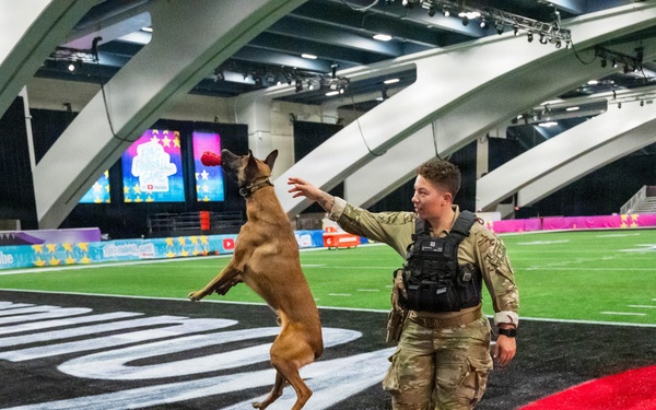 U.S. Coast Guard Maritime Safety and Security Team conduct K-9 sweeps in preparation for the Super Bowl.