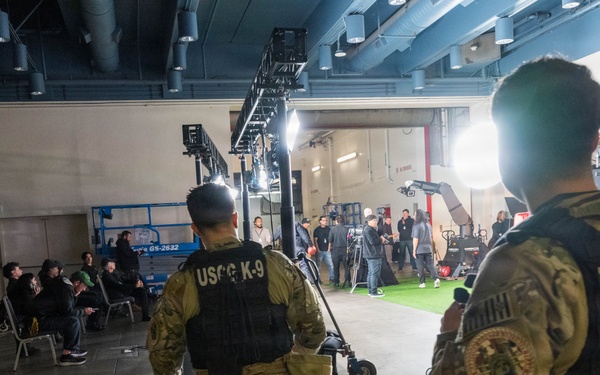 U.S. Coast Guard Maritime Safety and Security Team conduct K-9 sweeps in preparation for the Super Bowl.