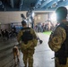 U.S. Coast Guard Maritime Safety and Security Team conduct K-9 sweeps in preparation for the Super Bowl.