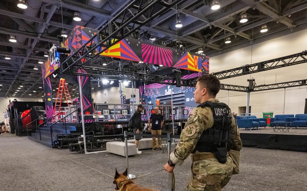 U.S. Coast Guard Maritime Safety and Security Team conduct K-9 sweeps in preparation for the Super Bowl.
