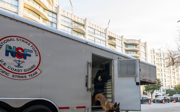U.S. Coast Guard Maritime Safety and Security Team conduct K-9 sweeps in preparation for the Super Bowl.