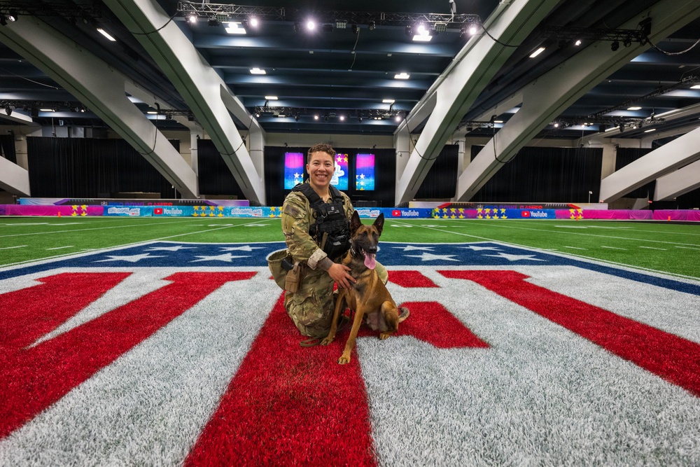 U.S. Coast Guard Maritime Safety and Security Team conduct K-9 sweeps in preparation for the Super Bowl.